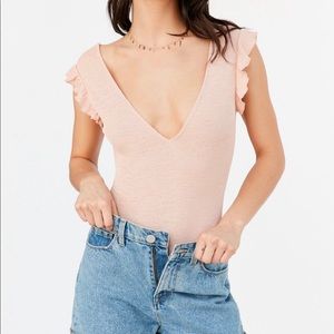 Out from Under Deep V-Neck Ruffle Bodysuit